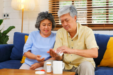 two elderly people sitting