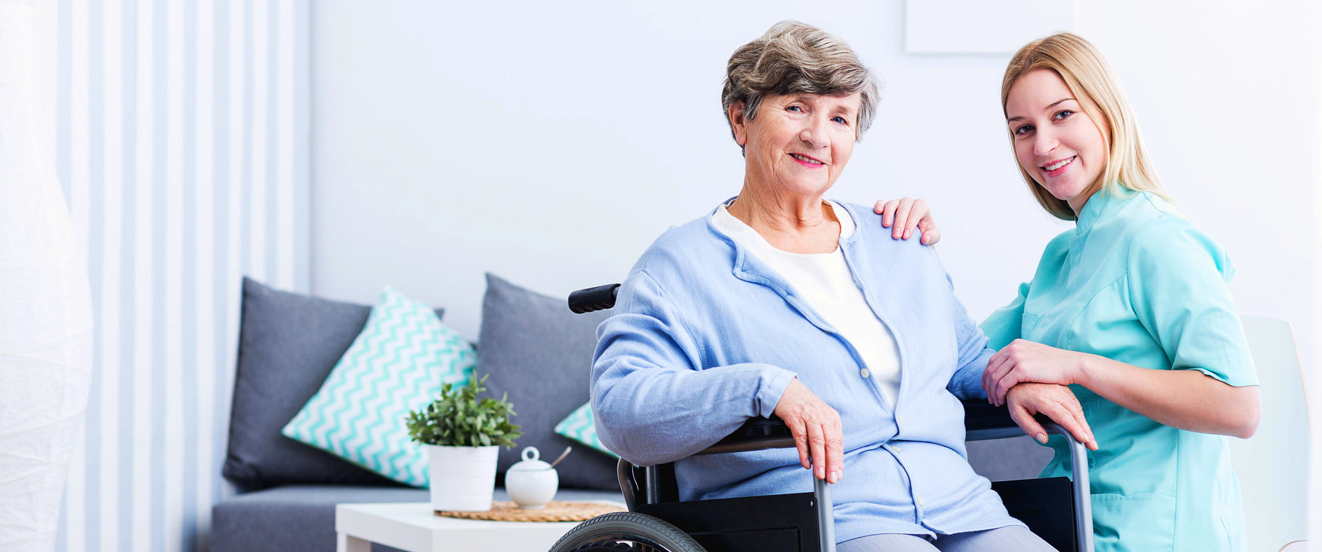 an elderly woman with a female nurse